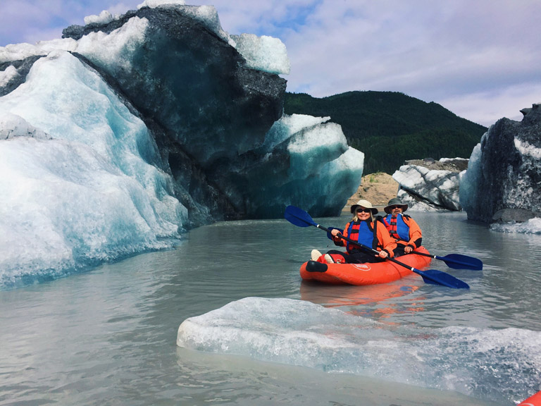 Glacier-Lake Inflatable Kayaking guests in Alaska - Explore McCarthy